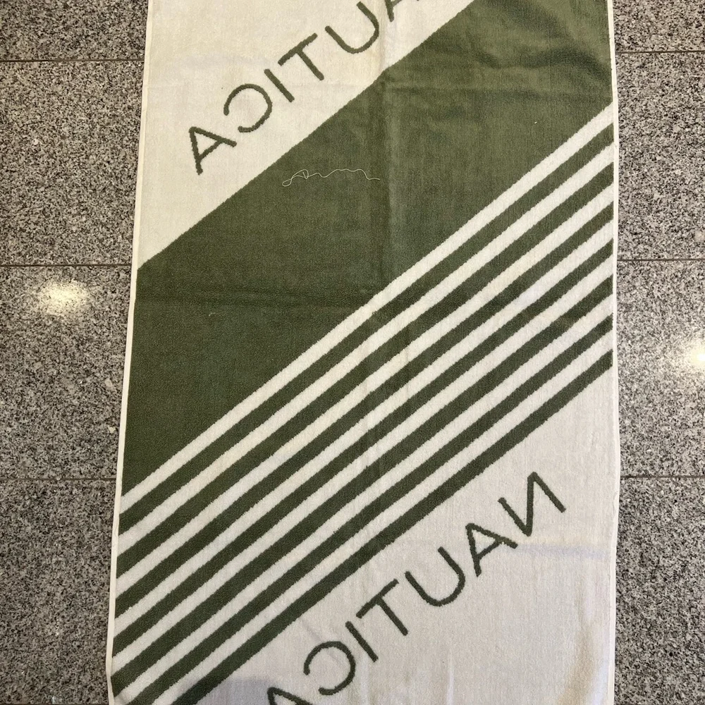 Nautica Olive Green & White Striped Towel Letters on the backside are inverted.